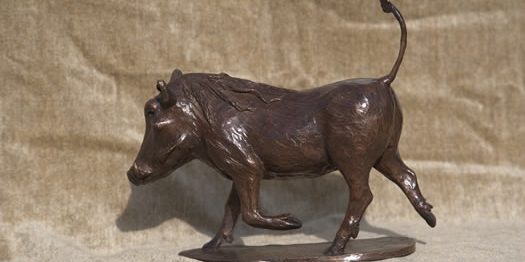 Lulu – bronze warthog by Margie Rome